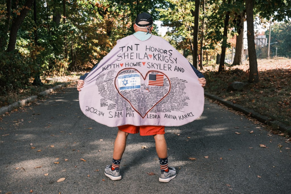 Kaufman wears a cape that honors leukemia patients and those who have donated to the cause. He's raised over $150,000 to support people battling leukemia and lymphoma blood cancers.