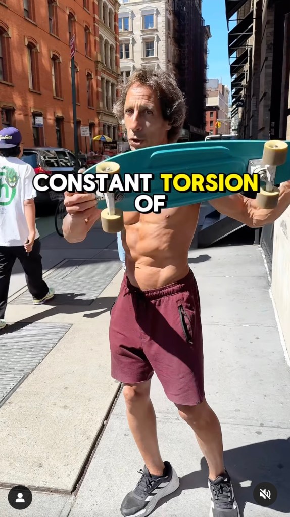 Screengrab of a shirtless man with skateboard from @BodyByMark social media.