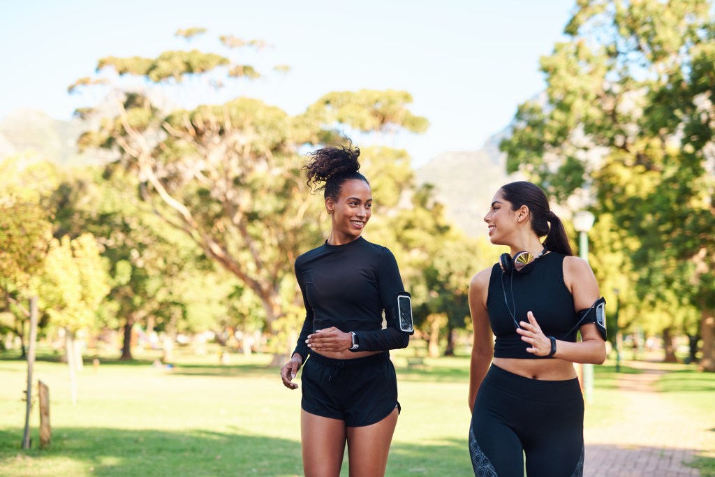 Exercise signals our brown fat to burn more calories because physical activity stimulates our sympathetic nervous system — also known as our "fight-or-flight" response. Here, two women jog in a park in Atlanta.