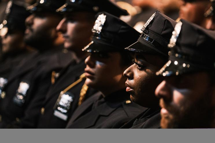 NYPD officers at a graduation ceremony