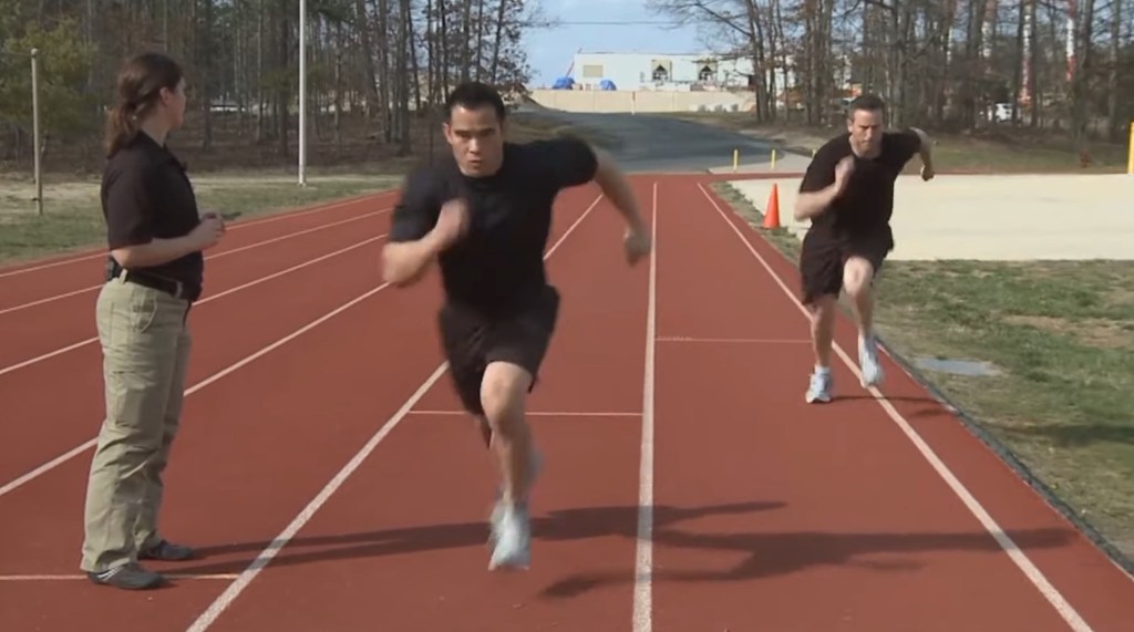 protocol-pass-fbis-sit-up-97500843 Applicants must score at least 12 points between the four events. The 300-meter sprint is shown here.